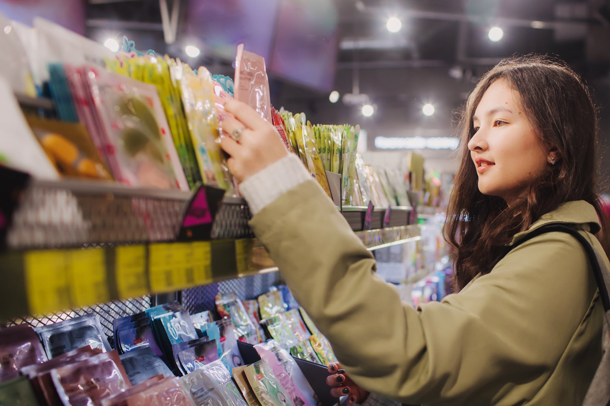 Young girl shopping in beauty store