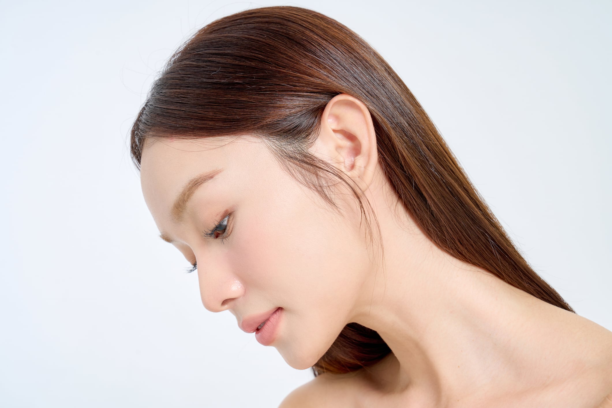 Asian woman with brown hair