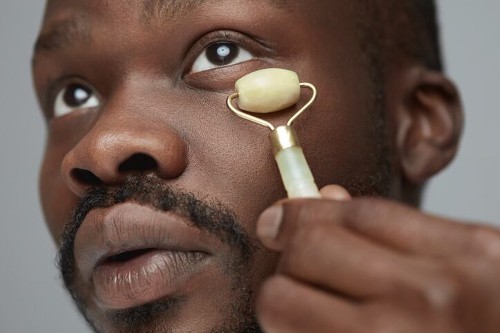 facialcare_face_skin_jaderoller_beauty_tool_sensory_massage_wellbeing_wellness_antiageing_man.jpg