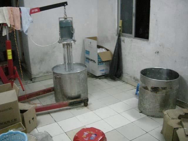 Inside-a-counterfeit-perfume-factory-3.jpg